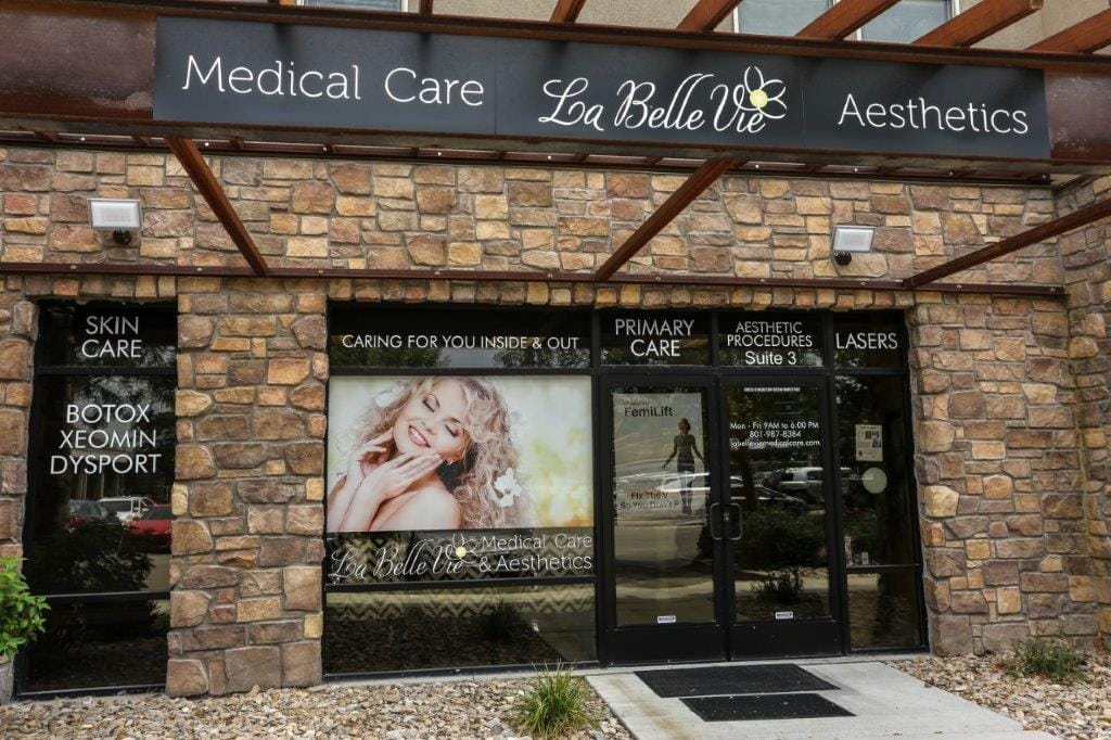 The La Belle Vie storefront at 248 E 13800 S in Draper: a stone facade under a "Medical Care · La Belle Vie · Aesthetics" sign, with Botox, Xeomin and Dysport lettered on the window